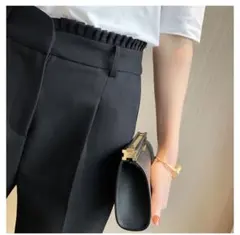 黒 テーパードパンツ