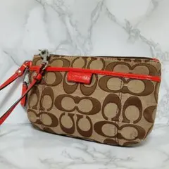 COACH コーチシグネチャー ポーチ リストレット ベージュ×レッド