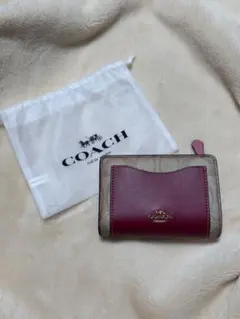 COACH 二つ折り財布 ピンク/ベージュのサムネイル