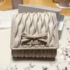 ジルバイジルスチュアート ミニリボン パフィフラップウォレット 財布 ピンクのサムネイル