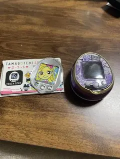 Tamagotchi 紫色 4U 本体と育成ブック - メルカリ