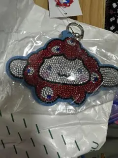 EXPO2025 サンリオ ミャクミャク キラキラレザーキーホルダー シナモ