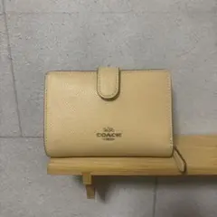 COACH 二つ折り財布 ベージュ