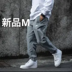 新品 NIKE ナイキ ウーブン ジョガーパンツ グレー 刺繍ロゴ