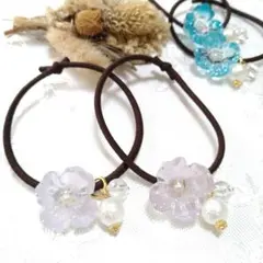 お花のヘアゴム 　2個セット 　春　紫　ピンク　花　フラワーモチーフ　レジン