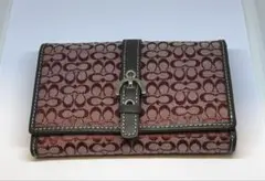 COACH ミニシグネチャー二つ折り財布のサムネイル