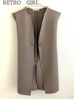 ノーカラージレ ロングベスト グレージュ バックリボン きれいめ オフィス 春秋