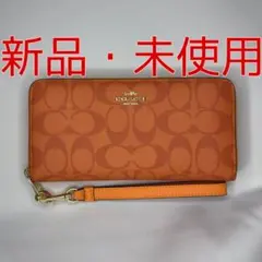 COACH シグネチャー 長財布 リストレット付き オレンジのサムネイル