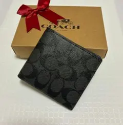 【オープン価格】新品COACH 二つ折り財布 シグネチャー アウトレット