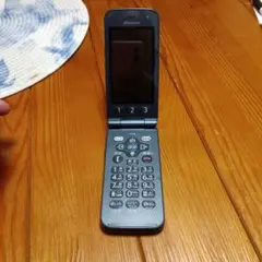 docomo らくらくホン F-01M バッテリー無 ネイビー SIMトレイ欠損