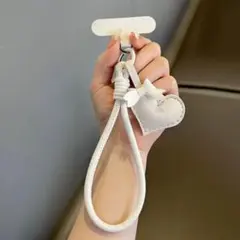 スマホストラップ ハンドストラップ ハート リボン ブラック 落下防止 白