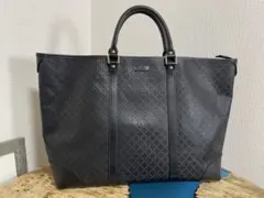 GUCCIブラック レザービジネスバッグ - メルカリ