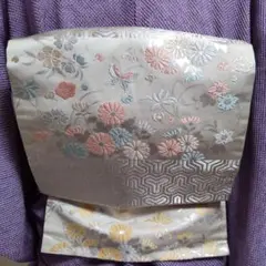 正絹　毘沙門亀甲蝶春秋花織り出し　九寸名古屋帯（１６３）