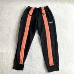 アディダスオリジナルス スウェットパンツ ジョガーパンツ M 黒 オレンジのサムネイル