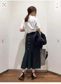 美品後ろボタンペプラムスカート36のサムネイル