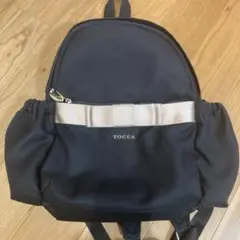 TOCCA 黒 リボン付きリュック