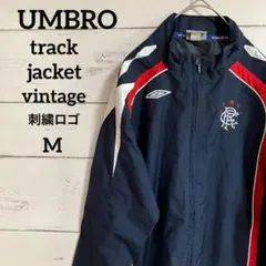 【アンブロ】レンジャーズナイロン トラックジャケットワンポイントチーム刺繍ロゴ