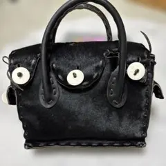 GRACE CONTINENTAL カービングストライブスオールハラコブラック