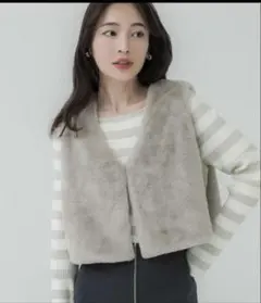 コカ　フェイクファーベスト　グレー
