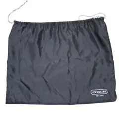 COACHのロゴとEST.1941のプリントのバック保存袋