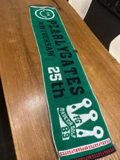 美品/クリーニング済　パーリーゲイツ 25周年記念 ニコちゃん マフラータオルのサムネイル