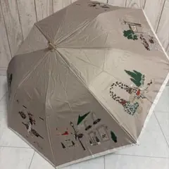 【新品未使用】DAKS（ダックス）晴雨兼用折りたたみ傘 ベージュ 可愛いイラストのサムネイル