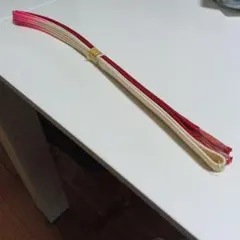 赤と白の帯締め 帯留め・帯飾り