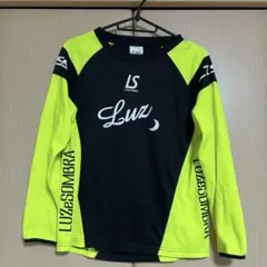 LUZ e SOMBRA 長袖プラクティスシャツ ブラック イエロー《160》