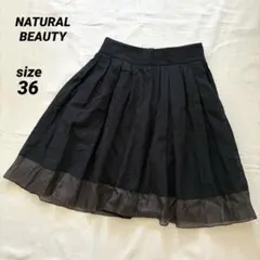 NATURAL BEAUTY ブラック　フレアスカート　膝丈　シアー裾　36のサムネイル