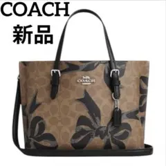 【新品】COACH モリートートバッグ25 リボン柄　CZ767