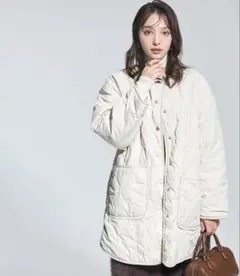 Lサイズ　ライトベージュ　coca 洗えるリバーシブルファーキルティングコート