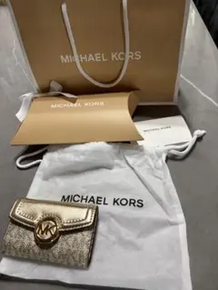 MICHAEL KORS イヤホンケース MKロゴ チャーム付き - メルカリ