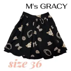 M'S GRACY エムズグレイシー　膝丈　スカート 総柄 リボン パール 花のサムネイル