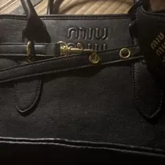 2025年最新】miumiu アーカイブの人気アイテム - メルカリ