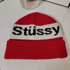 Stussy ニット帽 クリーム/レッド sロゴ ビーニー - メルカリ