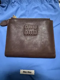 miumiu ナッパーレザー二つ折り財布 - メルカリ