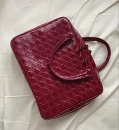 赤レザー　編み込みデザイン　コスメバッグ　エスティーローダー