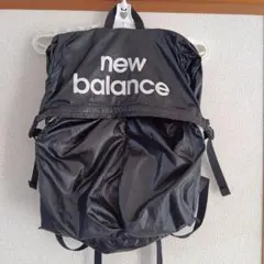 new balance黒　リュック