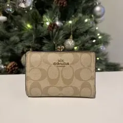 COACH 二つ折り財布 ベージュ