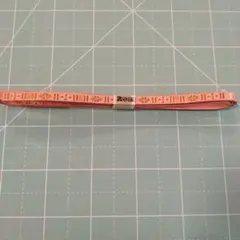 博多織　ピンクの帯締め 金色模様入り