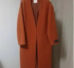 オレンジ ノーカラー ロングコート