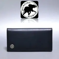 新品箱付き【 ハンティングワールド】バチューレザー フラップ長財布 紺のサムネイル