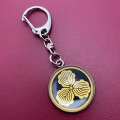 丸に抱き沢瀉紋（まるにだきおもだか） 家紋 キーホルダー - メルカリ