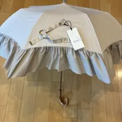 グレイシー　持ち手付き　フリルたっぷり　晴雨兼用日傘　ベージュ グレイシー 持ち手付き フリルたっぷり 晴雨兼用日傘 ベージュ - メルカリ
