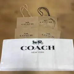 COACH ショップ袋COACH ロゴ入り不織布巾着　大きめ