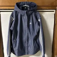 adidas デニムウーブンルーズフィットウィンドブレーカー　IK9880
