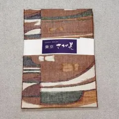 【A60】東京さが美 オレンジ系象徴柄 名古屋帯