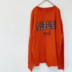 長袖トップス　オレンジ　プリントシャツ　ロゴシャツ