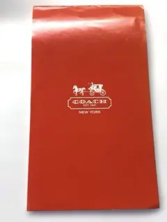 COACH 縦型メモ帳 ノート 赤 レッド ロゴ 残量ありのサムネイル