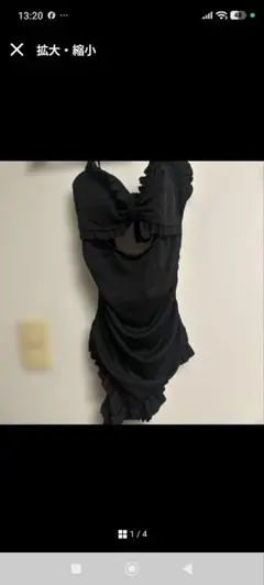 黒いフリル付きワンピース水着のサムネイル